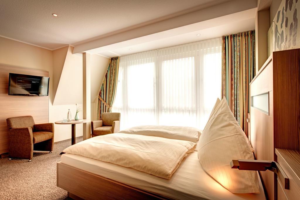 Hotel Muschelgrund Куксхафен Номер фото